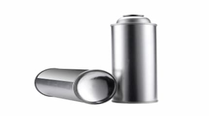¿Por qué la parte inferior del bote de aerosol es curva?